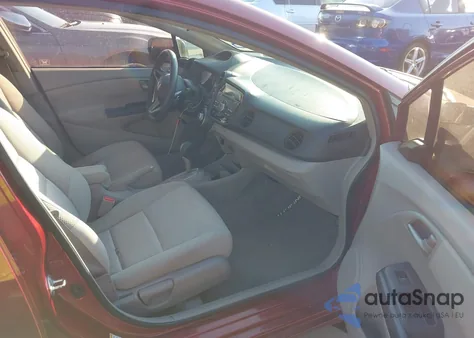 2010 Honda Insight Ex z USA, uszkodzony, nr VIN JHMZE2H72AS009258